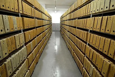 archive: a repository or other place for storing material (such as documents and records) no longer in...