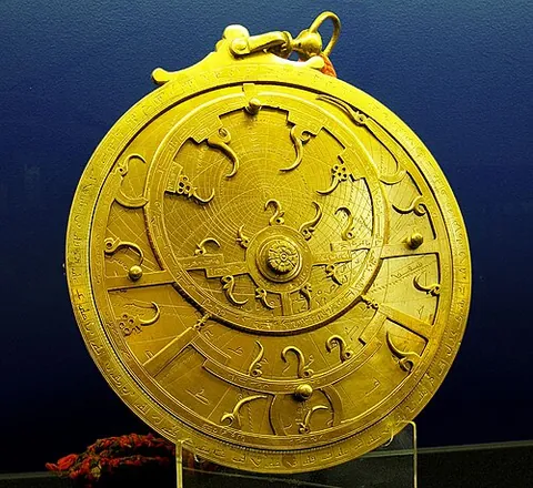 astrolabe: an astronomical and navigational instrument for gauging the altitude of the Sun and stars