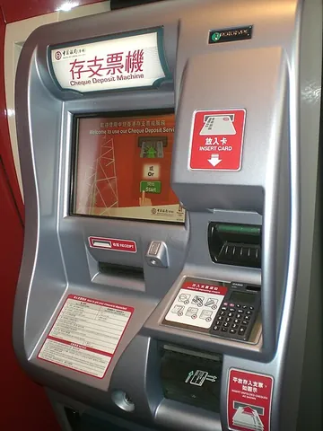 atm machine: a pleonastic but common variant of ATM