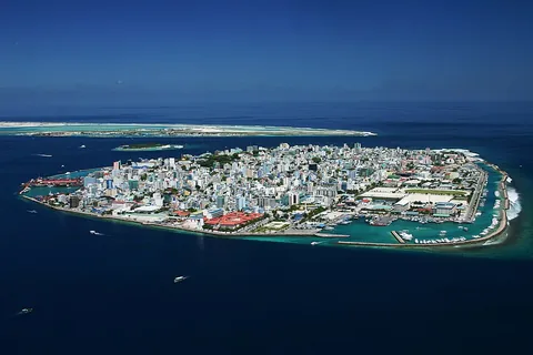 atoll: a type of island consisting of a ribbon reef that nearly or entirely surrounds a lagoon and...