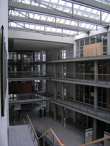 atrium: a central room or space in ancient Roman homes, open to the sky in the middle; a similar space in...