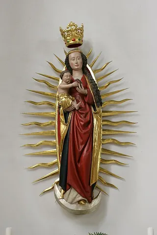 aureola: radiance of luminous cloud that surrounds the figure in a painting of a sacred personage
