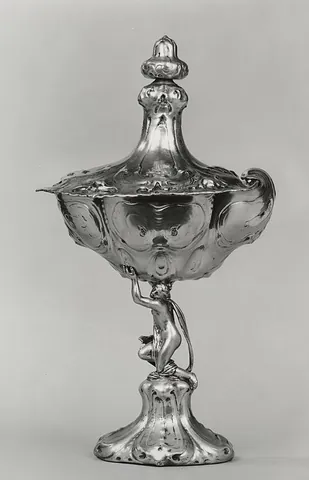 auricular style: an ornamental style of the first half of the 17th century, characterized by stylized and softly...
