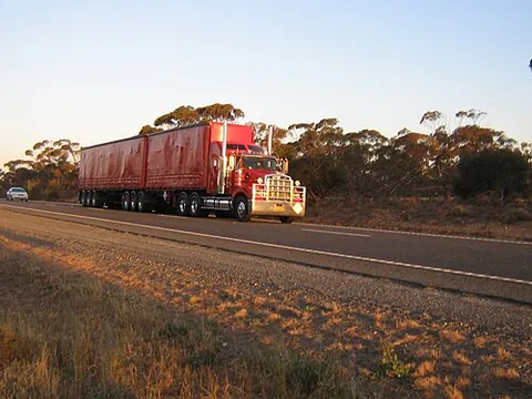 b-double: a truck and trailer combination consisting of a prime mover coupled to two trailers without the use...