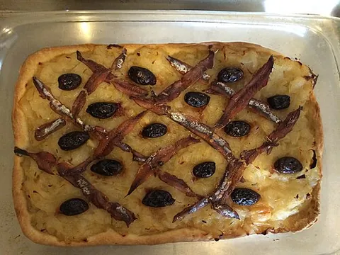 pissaladière: a pie from southern France, similar to pizza, without tomatoes or cheese, usually topped with...