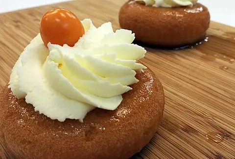 baba au rhum: a yeast cake soaked in a syrup containing rum