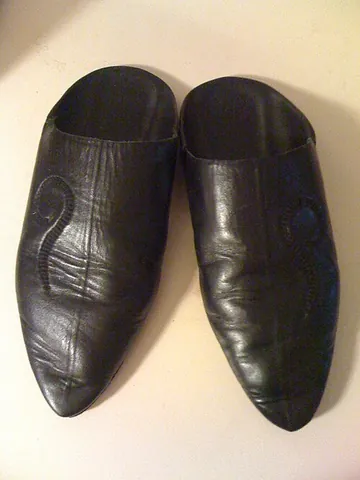 babouche: a Turkish or Moroccan slipper having no heel