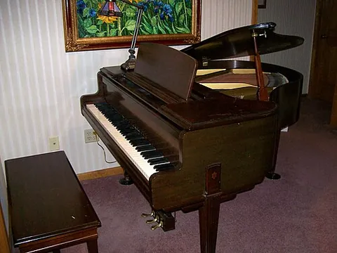 baby grand piano: a small grand piano