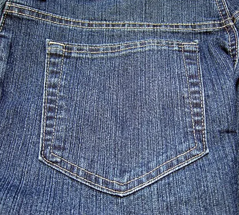 back pocket: a pocket found on the back of a pair of trousers