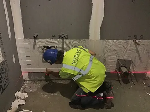 backerboard: boards used as underlayment for tile, plaster, or other materials