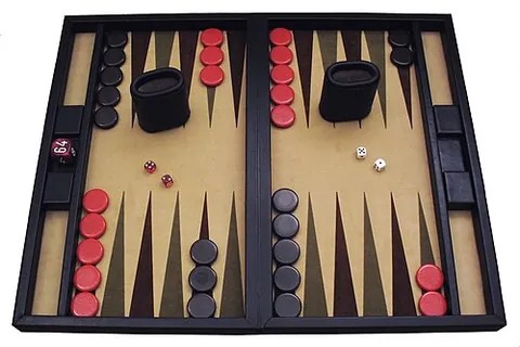 backgammon: a board game for two players in which each has 15 stones which move between 24 triangular points...