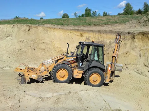 backhoe: a piece of excavating equipment, either an integral subassembly or an attachment, consisting of a...