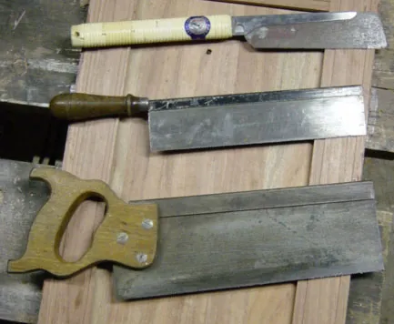 backsaw: a handsaw that has a reinforcement along its back edge
