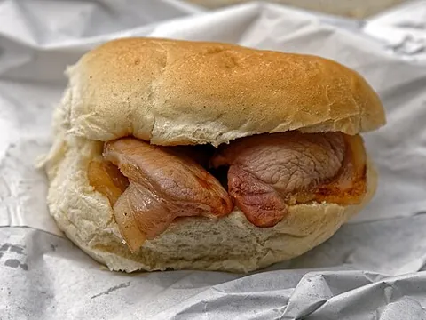 bacon roll: a bread roll with a bacon filling