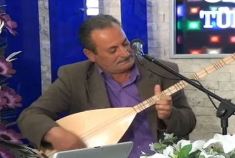 baglama: a seven-stringed musical instrument in various cultures around the eastern Mediterranean, with a...