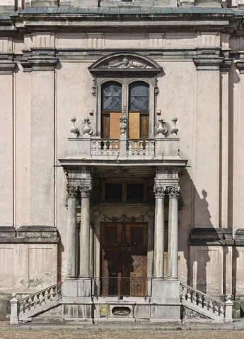 balcony: an accessible structure extending from a building, especially outside a window