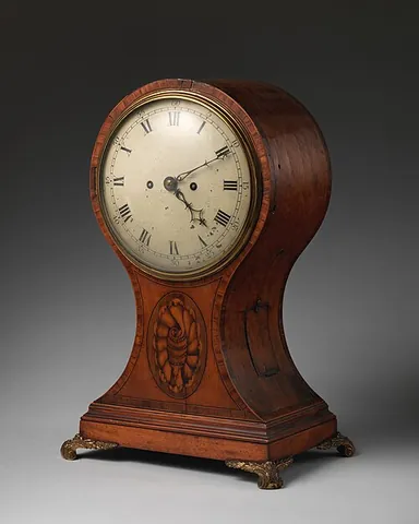 balloon clock: a form of bracket clock with a balloon-shaped case