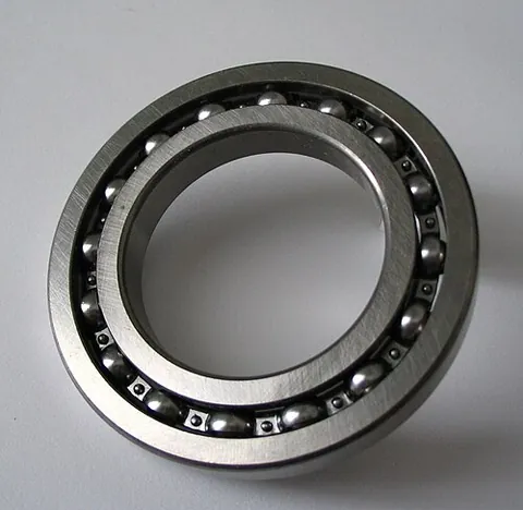 ballrace: a ring with a groove in which rolling elements (such as balls) ride, forming part of a...