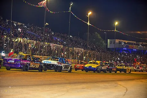 banger race: a motorsport event in which cars race around a track while trying to damage one another