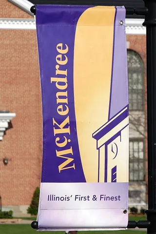 banner: a flag or standard used by a military commander, monarch or nation