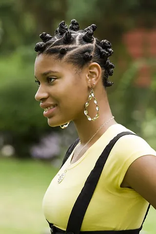 bantu knot: a tight bun or knot of hair, part of a hairstyle having many such knots on a base of square or...