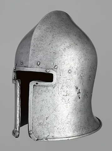 barbute: a type of visorless helmet, of 15th-century Italian design, including a T or Y shaped opening for...