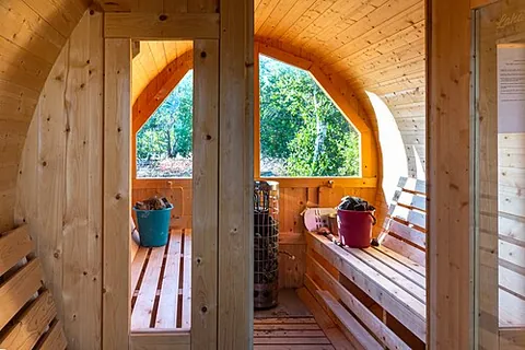 barrel sauna: a kind of cylindrical sauna, resembling a barrel lying on its side
