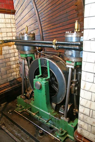 barring engine: a small, auxiliary motor that slowly rotates a large main engine (i.e. massive marine diesel or...