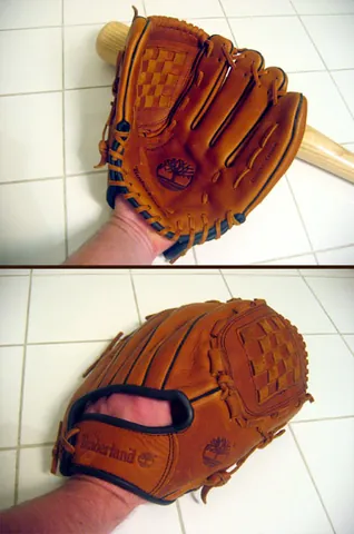 baseball mitt: a glove used when playing baseball to protect the hand and enhance catching ability