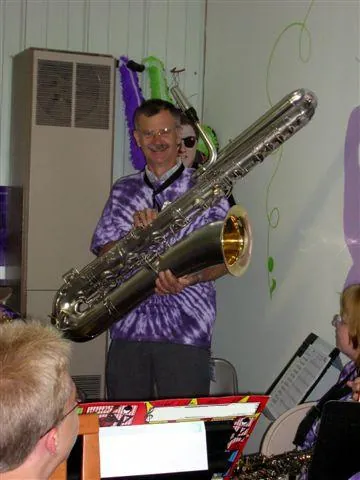 bass saxophone: a member of the saxophone family of woodwind instruments that is smaller than the contrabass...