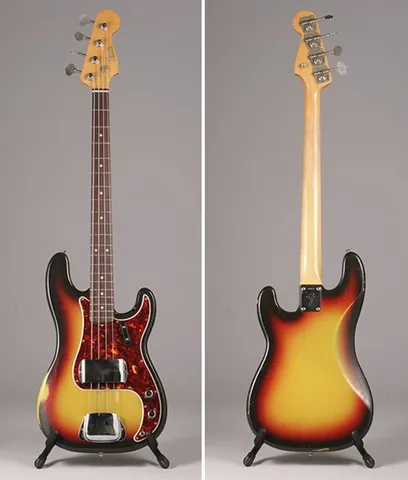 bass: of sound, a voice or an instrument, low in pitch or frequency