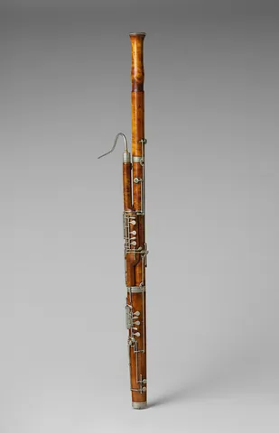 bassoon: a musical instrument in the woodwind family, having a double reed and playing in the tenor and bass...