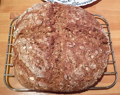 bastable cake: a round loaf of soda bread that is baked in a bastable (“an earthenware or cast-iron pot used for...