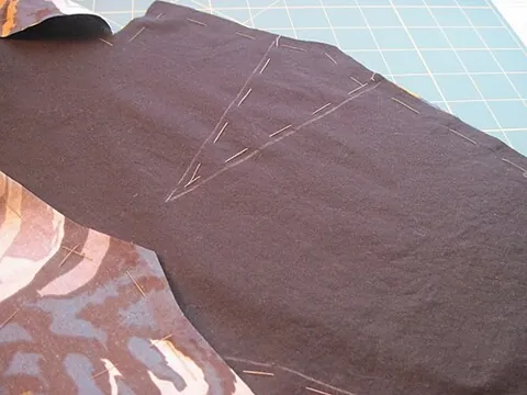 baste: to sew with long or loose stitches, as for temporary use, or in preparation for gathering the fabric