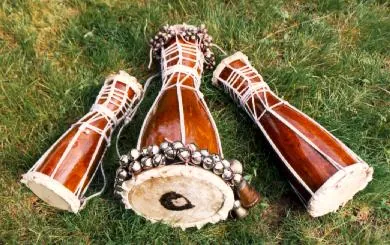 bata: a ceremonial double-headed drum played in triplet in the religion of santería, especially in Cuba...