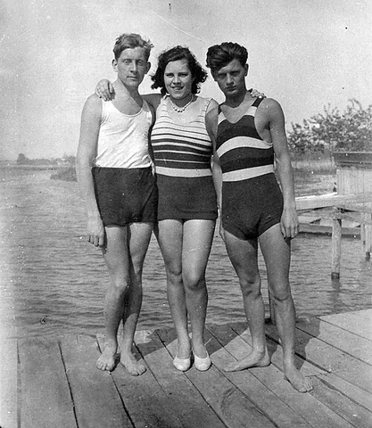 bathing suit: a tight-fitting garment worn for swimming, especially the one piece garment worn by women and...