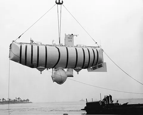 bathyscaphe: a self-propelled deep-sea diving submersible for exploring the ocean depths, consisting of a crew...