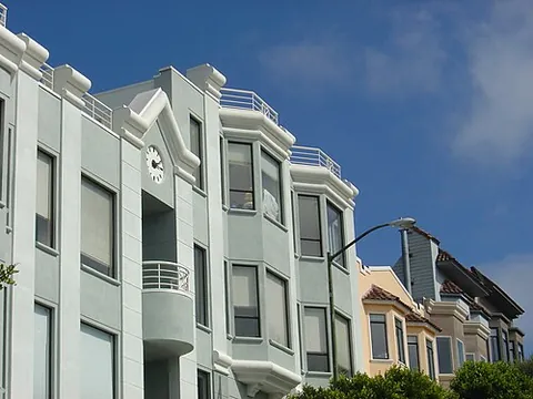 bay window: a window space projecting outward from the main walls of a building and forming a bay in a room