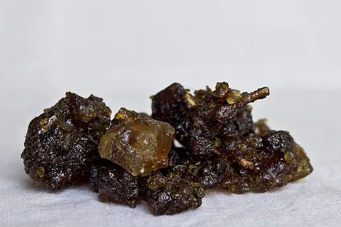 bdellium: an aromatic gum-like balsam extracted from one of several species of tree in the genus Commiphora