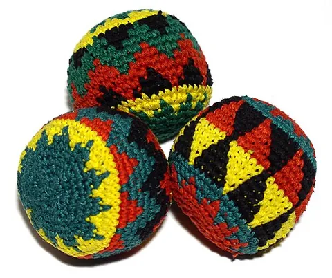 beanbag: a small cloth bag filled with drybeans, used as a toy or for exercising the hands