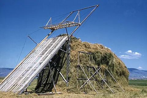 beaverslide: a slanted, wooden device used to stack hay