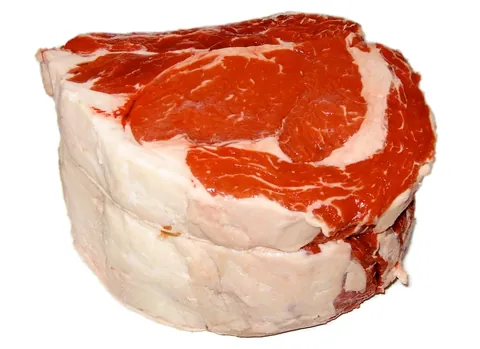 beef: the meat from cattle or other bovines; especially, that from adults