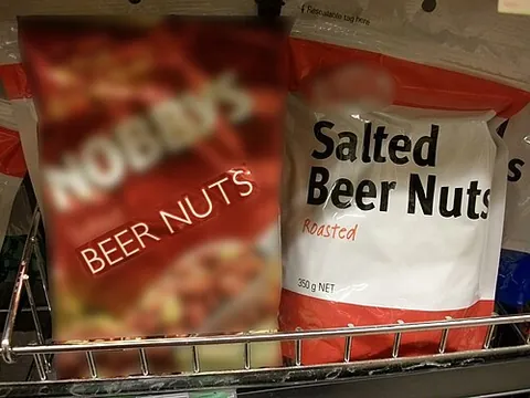 beer nut: a peanut served with its husk (but not its shell)