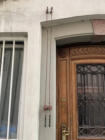 bell-pull: a rope that rings a bell