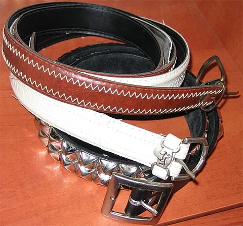 belt: a band worn around the waist to hold clothing to one's body (usually pants), hold weapons (such as...