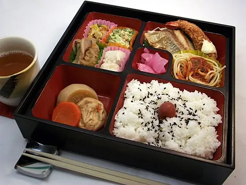 bento box: a partitioned, traditionally lacquered, lunchbox in which a bento (“Japanese takeaway lunch”) is...
