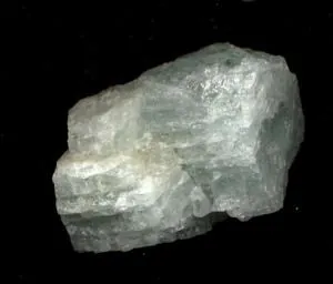 beryl: a mineral of pegmatite deposits, often used as a gemstone (molecular formula Be₃Al₂Si₆O₁₈)