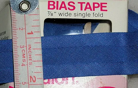 bias tape: a narrow strip of fabric, cut on the bias (diagonally across the weave, for greater stretchiness),...