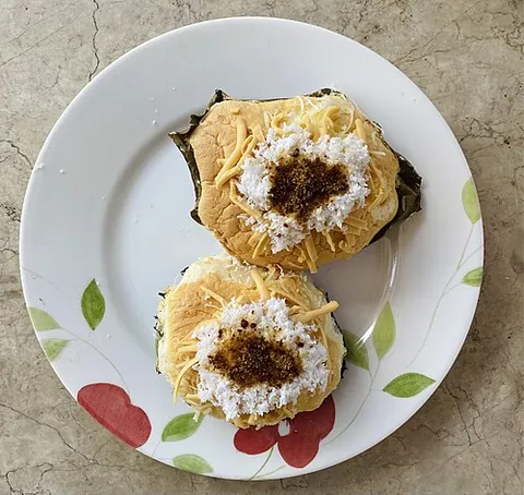 bibingka: a rice cake made using rice flour, sugar and coconut milk and wrapped in banana leaves