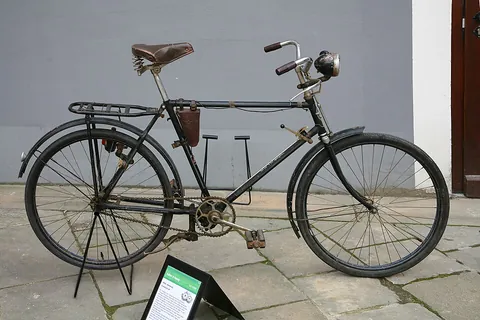 bicycle: a vehicle that has two primary wheels, one behind the other, a steering handle, and a saddle seat...